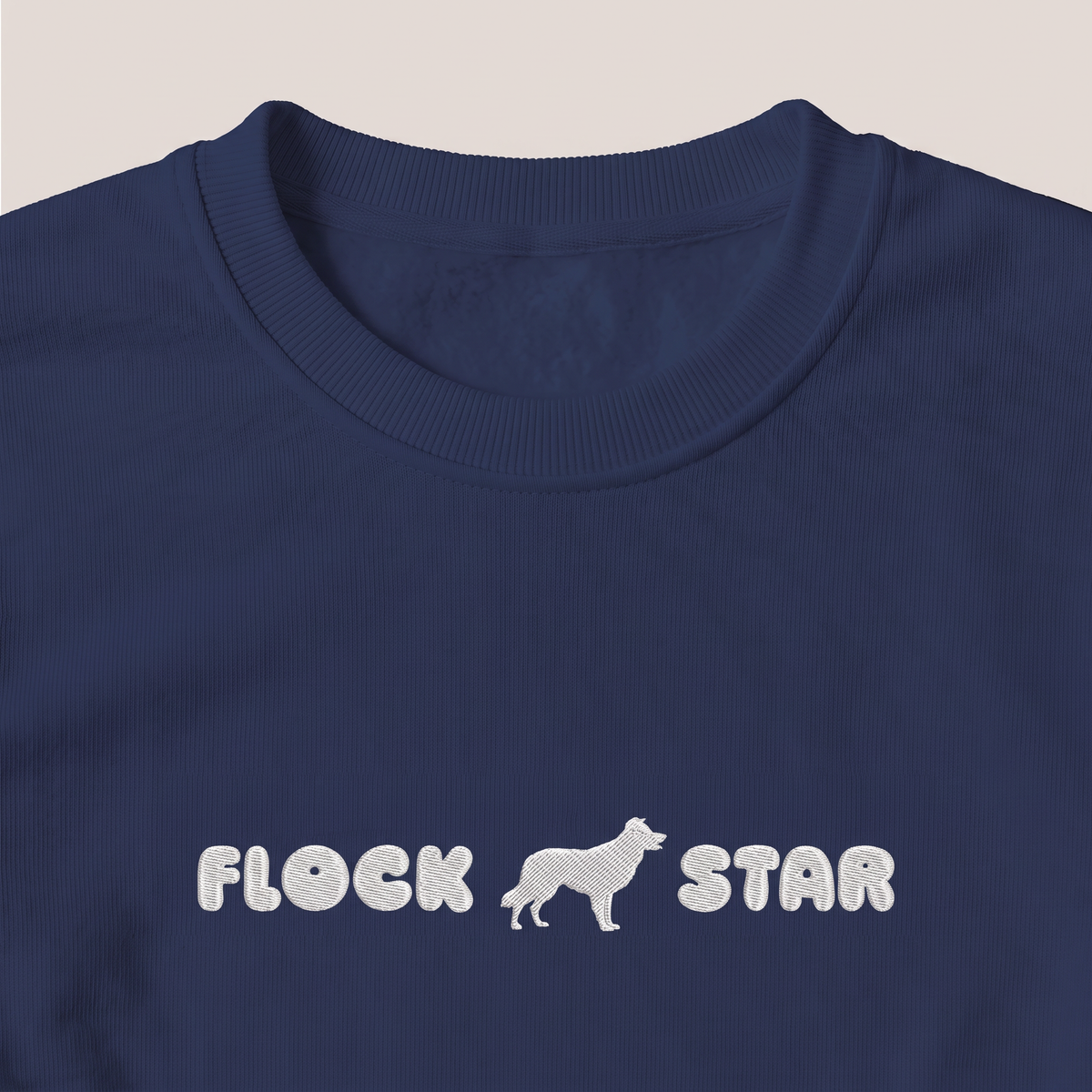Flock Star Border Collie embroidered sweatshirt, close-up of the embroidery