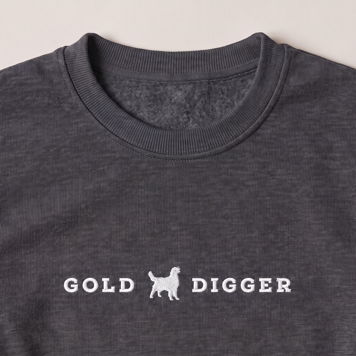 Gold Digger Golden Retriever embroidered sweatshirt, close-up of the embroidery
