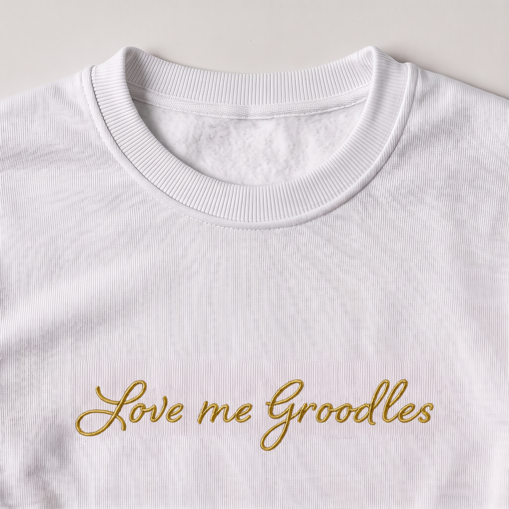 Love Me Groodles Groodle embroidered sweatshirt, close-up of the embroidery