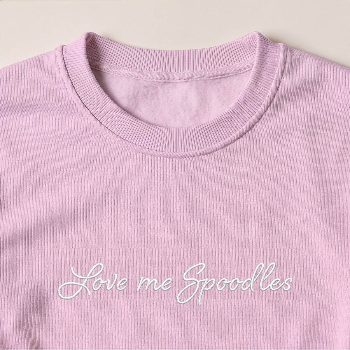 Love Me Spoodles Spoodle embroidered sweatshirt, close-up of the embroidery