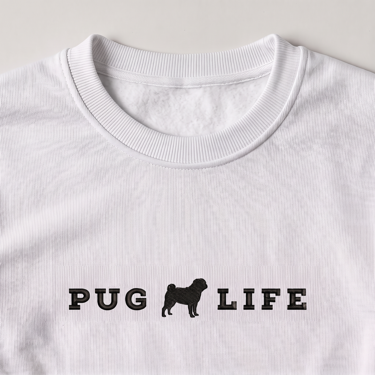 Pug Life Pug embroidered sweatshirt, close-up of the embroidery