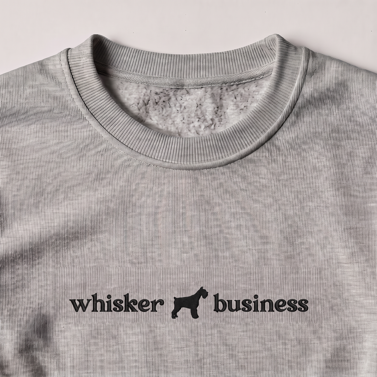 Whisker Business Schnauzer embroidered sweatshirt, close-up of the embroidery